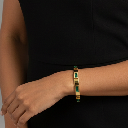 Woman wearing a black sleeveless top against a gray background