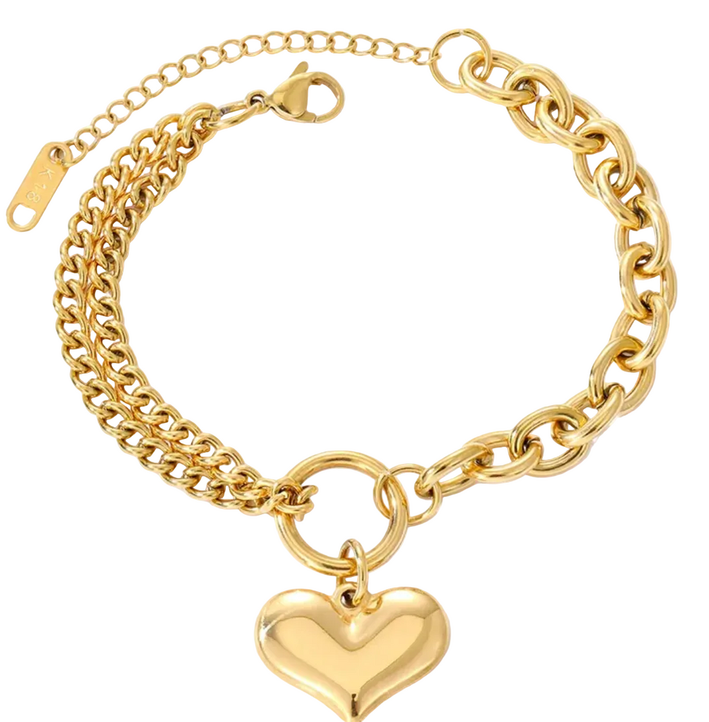 Gold chain bracelet with a heart-shaped charm on a white background