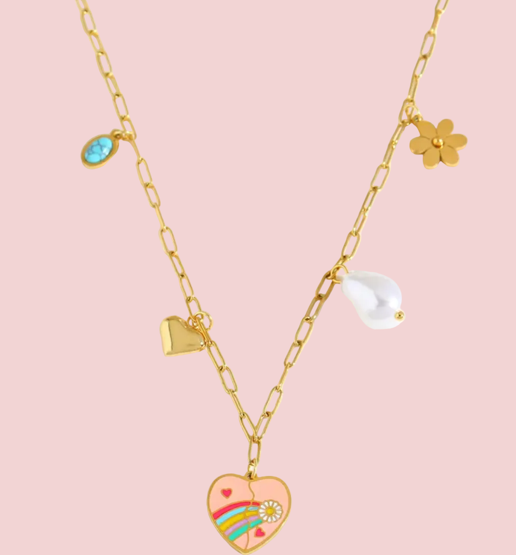 Gold chain necklace with heart-shaped rainbow pendant on a white background